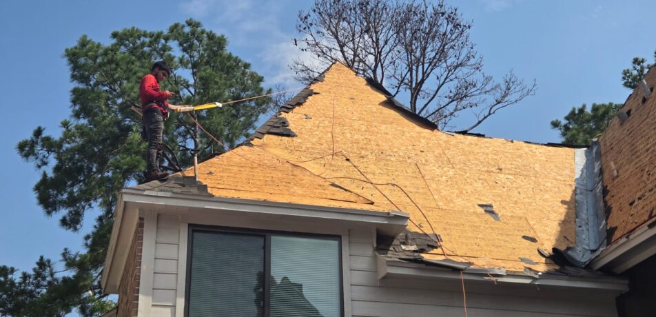 Tear-off of old shingles on 9,500 sq. ft. roof in Spring Texas