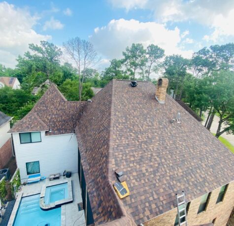 Newly installed ridge vent system on large residential roof in Spring Texas