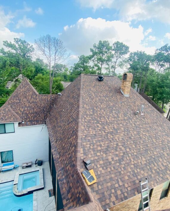 Newly installed ridge vent system on large residential roof in Spring Texas