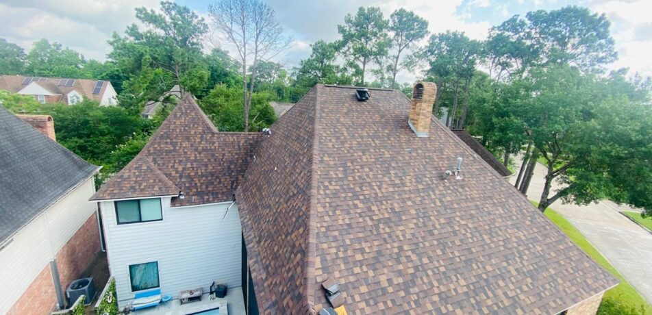 Newly installed ridge vent system on large residential roof in Spring Texas