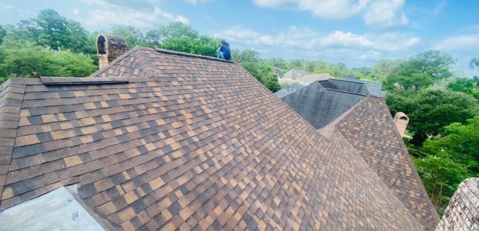 Completed roof with Onyx Black TruDefinition Duration shingles on high-end home