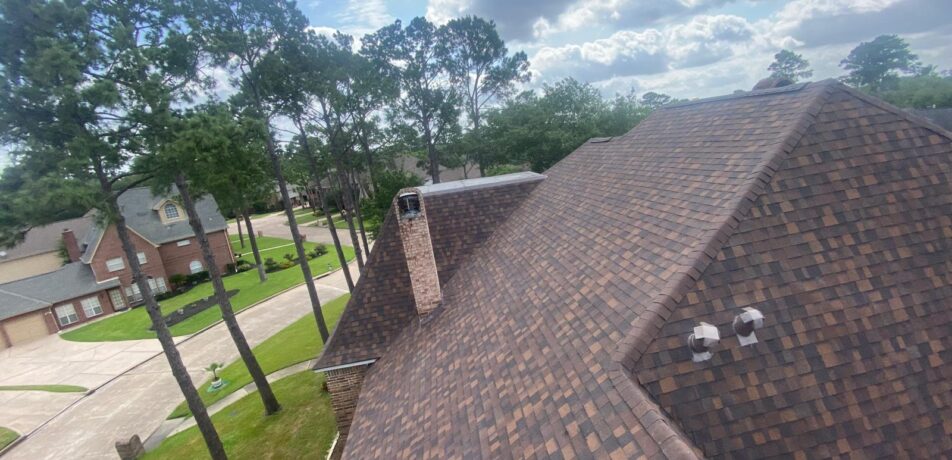 Owens Corning Onyx Black shingles installation in progress